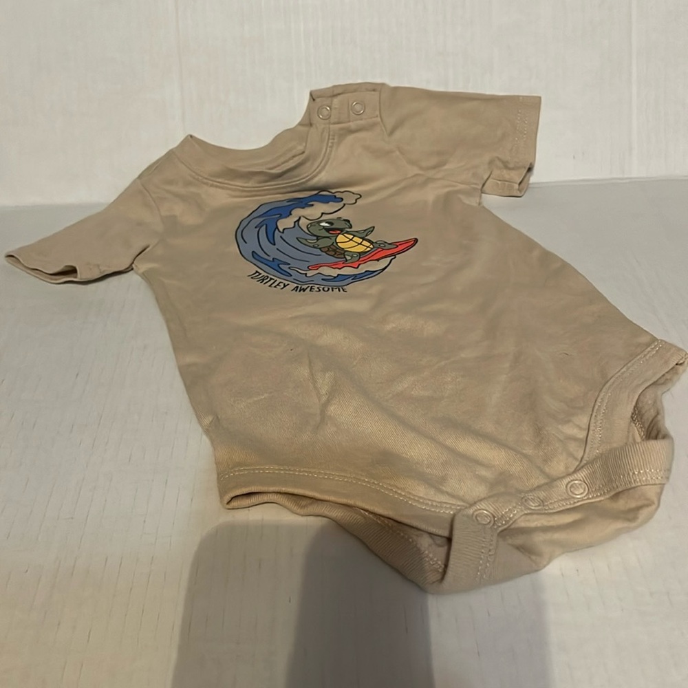 Garanimals size 18 months cream onesie. LIKE NEW